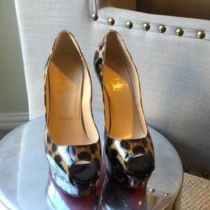Louboutin patent leather leopard print heels
